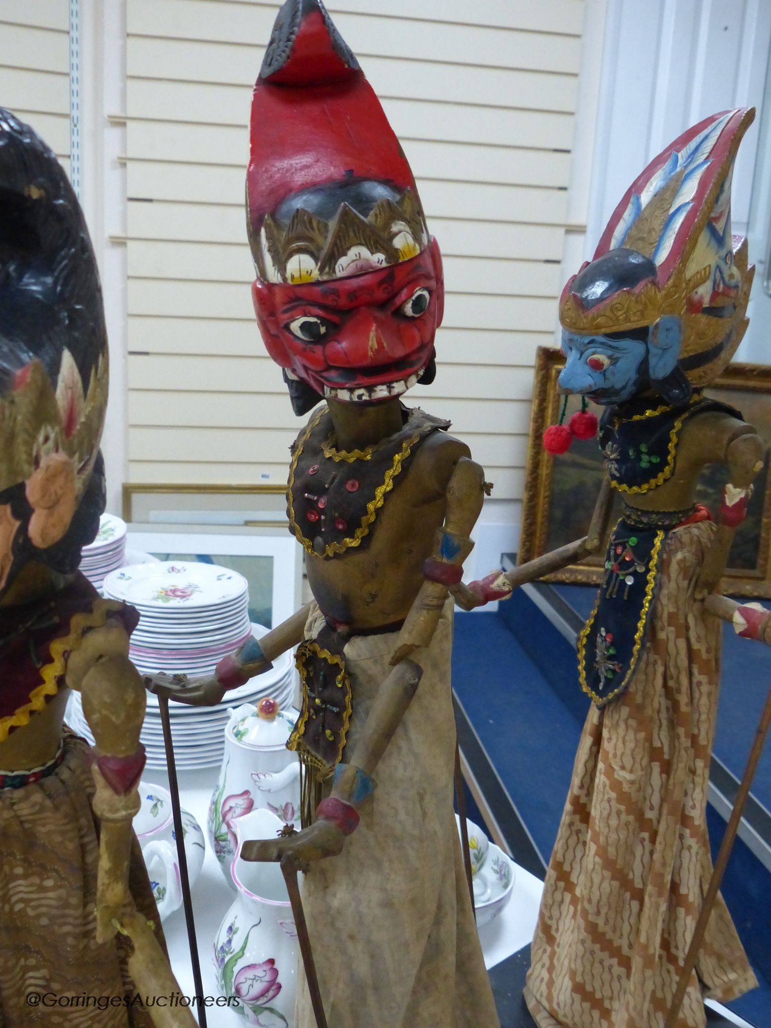 Three Indonesian stick puppets, tallest 73cm